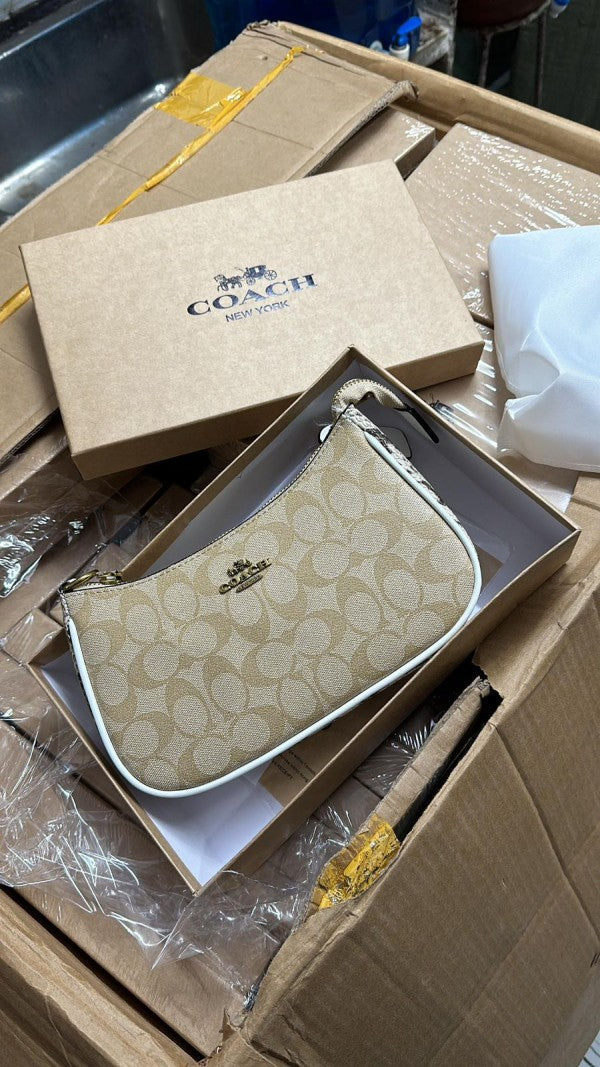 Coaach teri shoulder bag in signature canvas bag with box