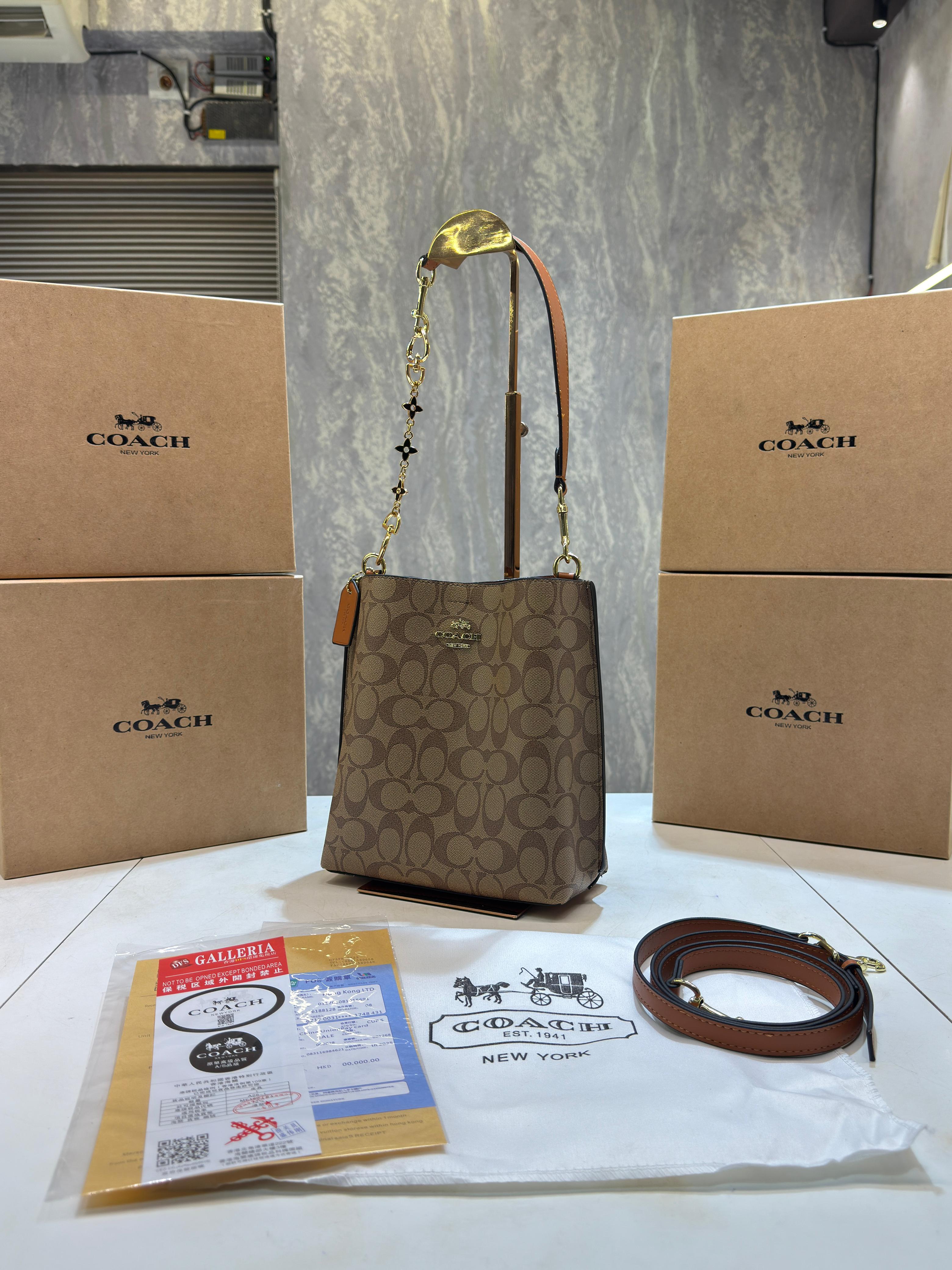Coacch mollie signature bucket bag with extra long sling and carry bag