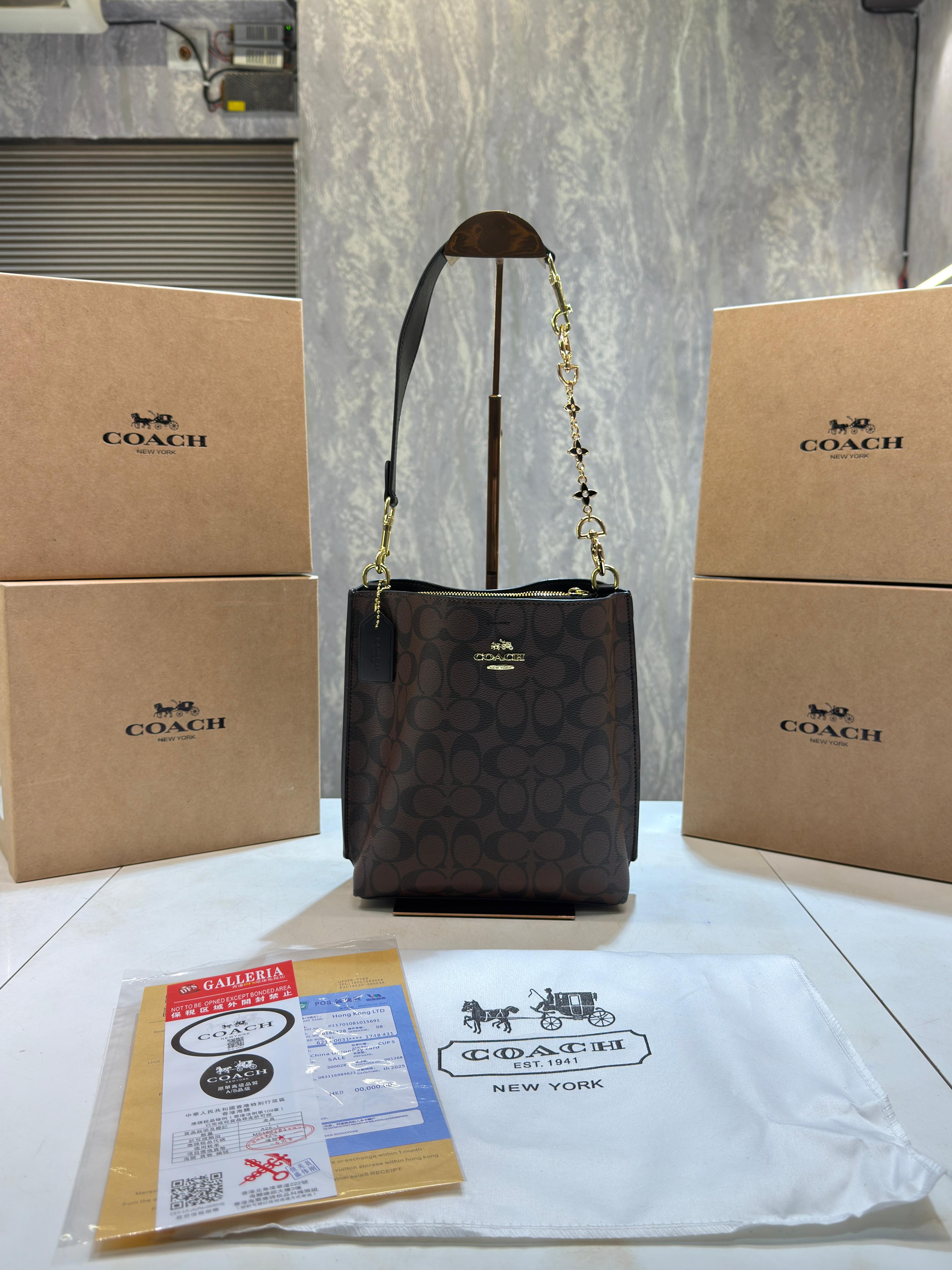 Coacch mollie signature bucket bag with extra long sling and carry bag