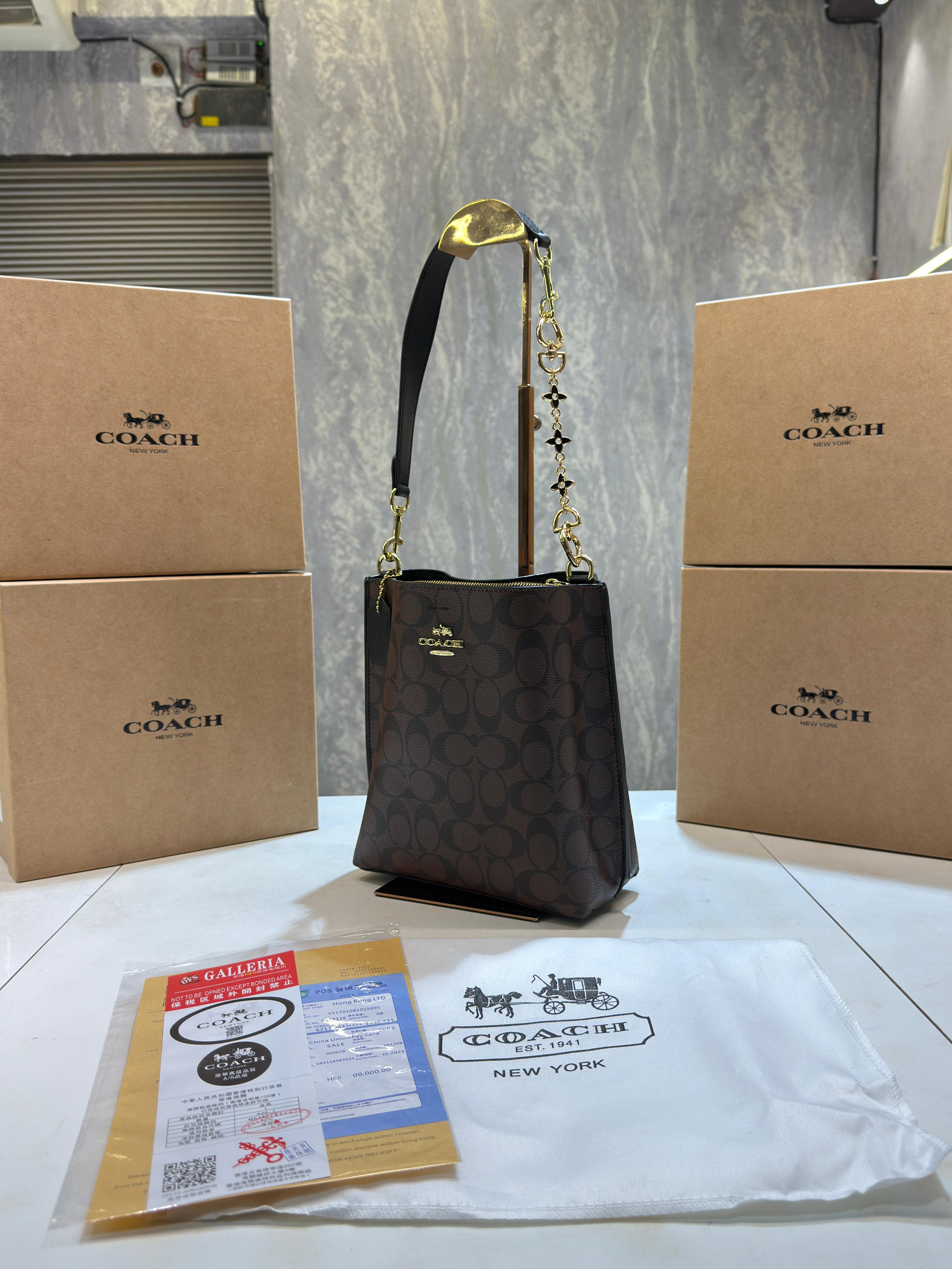 Coacch mollie signature bucket bag with extra long sling and carry bag