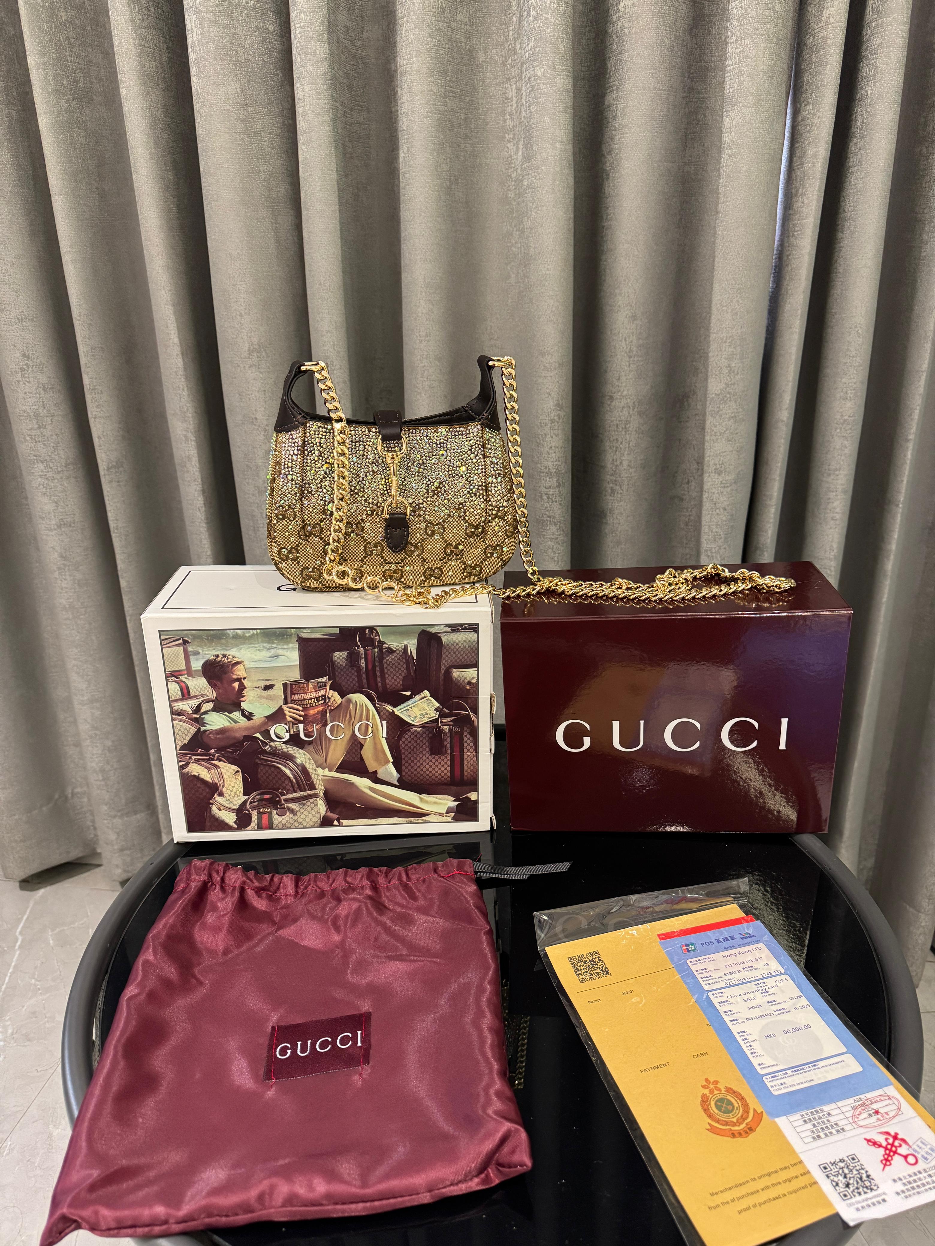 Guccii Jackie Notte mini bag featuring a crystal embellished