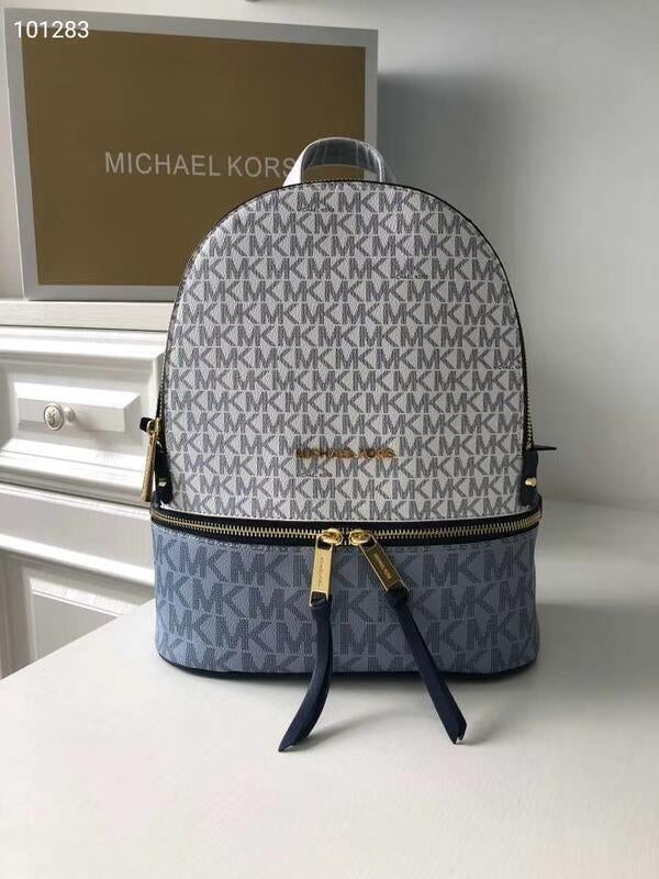 Miichael Korrs backpack with dust cover
