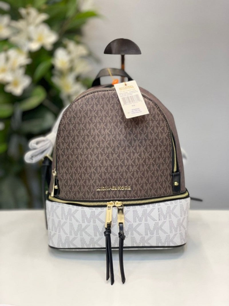 Miichael Korrs backpack with dust cover
