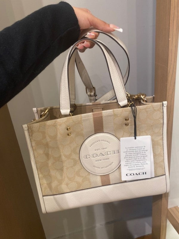 Coaach dempsey carryall signature jacquard stripe and patch with box
