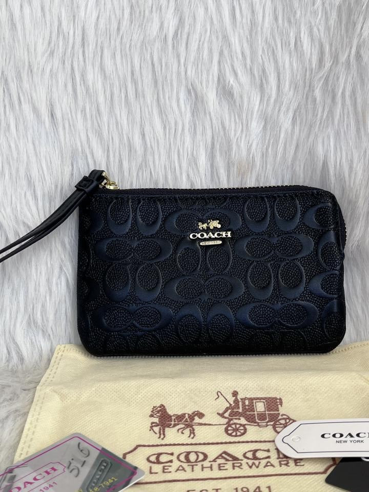 Coachh Emboss Wristlet With DustCover