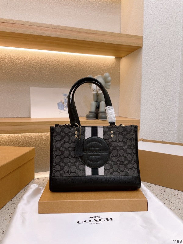 Coaach dempsey carryall signature jacquard stripe and patch with box