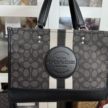 Coaach dempsey carryall signature jacquard stripe and patch with box