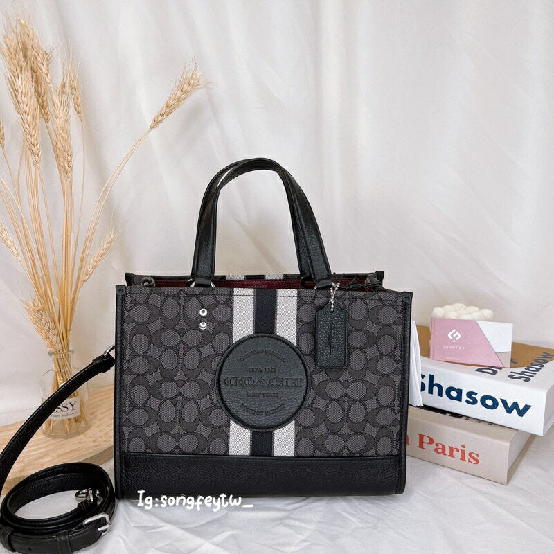 Coaach dempsey carryall signature jacquard stripe and patch with box