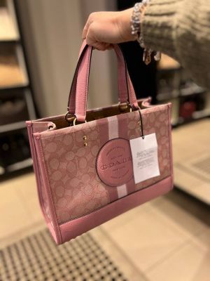 Coaach dempsey carryall signature jacquard stripe and patch with box