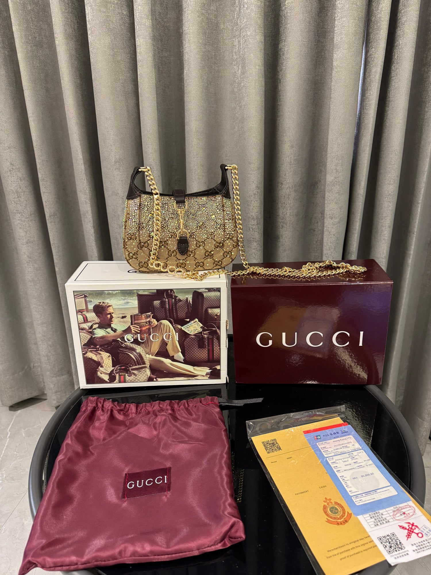 Guccii Jackie Notte mini bag featuring a crystal embellished
