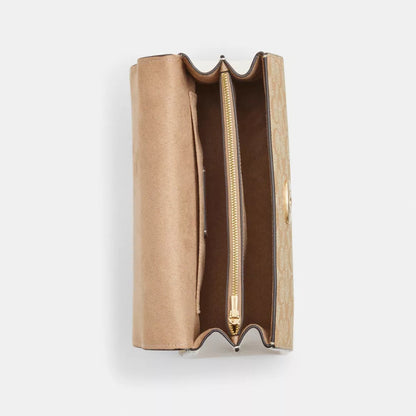 COAACH Eliza Top Handle In Signature Canvas